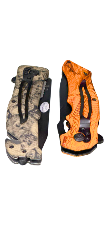 Two folding knives, one with a camouflage handle and the other with an orange textured handle. Both have black clips.